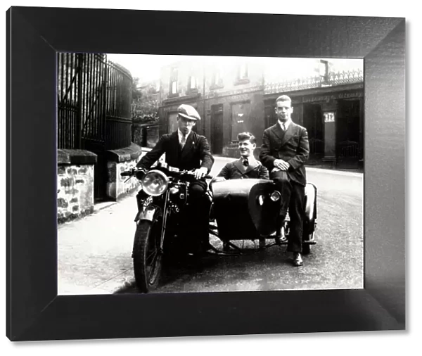 Three young men on veteran BSA motorcycle