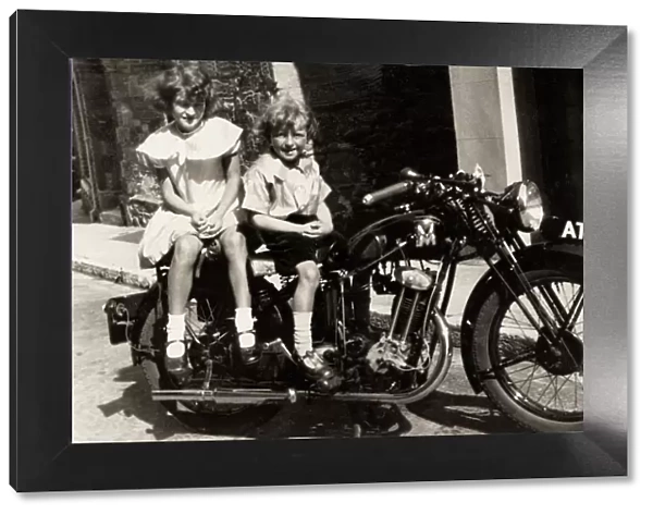 Two girls on a 1934 Matchless motorcycle