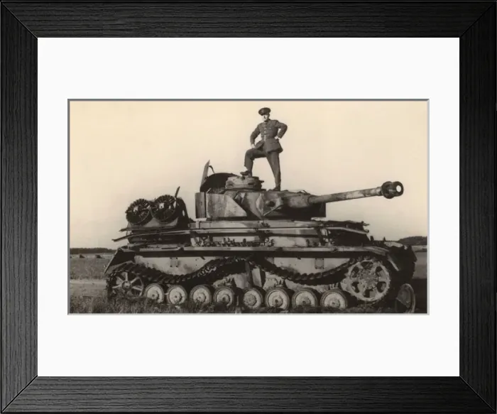 Framed Print : British soldier standing on top of disused tank Framed Print : British soldier standing on top of disused tank