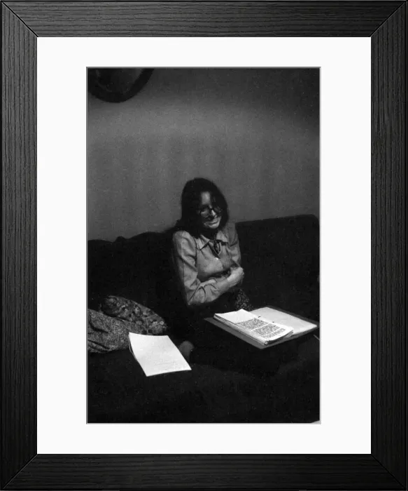 Framed Print : Soho, London - woman checking a report Framed Print : Soho, London - woman checking a report