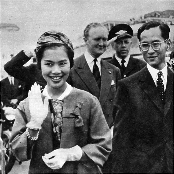 King Bhumibol Adulyadej and Queen Sirikit departing