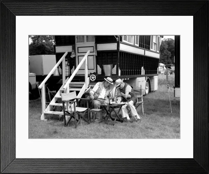 Framed Print : Two men sitting outside a caravan Framed Print : Two men sitting outside a caravan