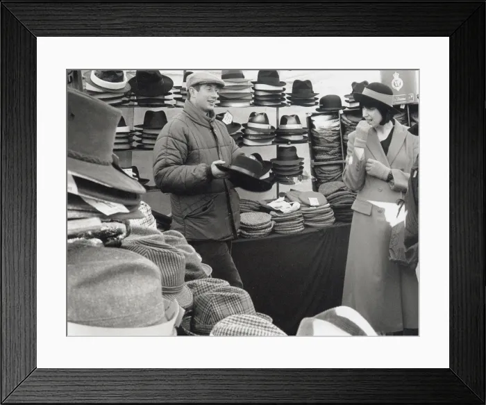 Framed Print : Hat seller at a market, Suffolk, England Framed Print : Hat seller at a market, Suffolk, England