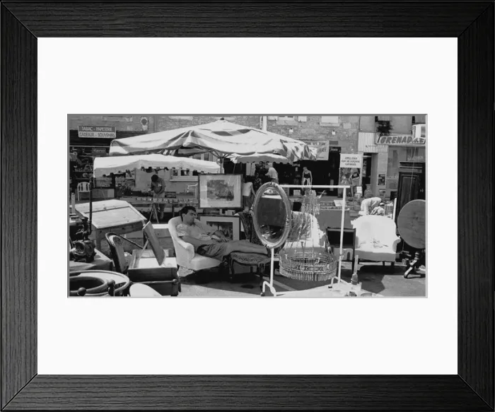Framed Print : Sleeping man at antique stall, Duras, France Framed Print : Sleeping man at antique stall, Duras, France