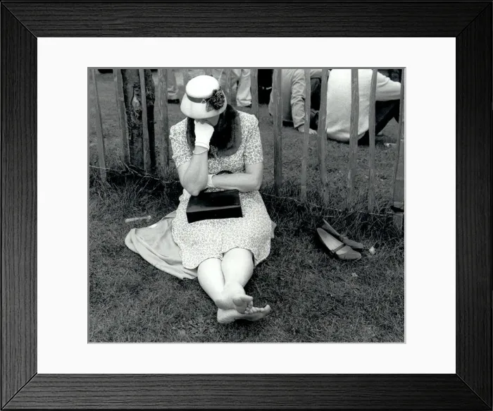 Framed Print : Woman resting on grass at Goodwood, West Sussex Framed Print : Woman resting on grass at Goodwood, West Sussex