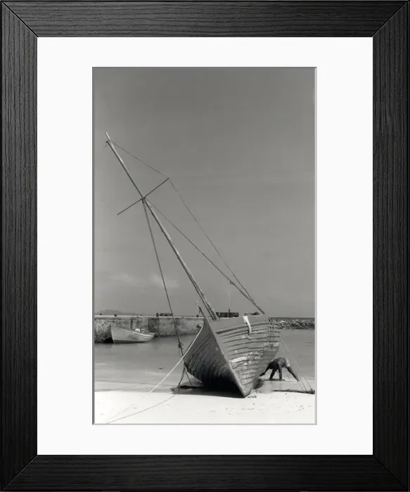 Framed Print : Man and boat, La Digue, Seychelles Framed Print : Man and boat, La Digue, Seychelles