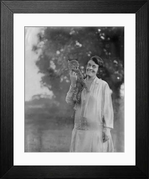 Framed Print : Settler with cheetah cub, Nakuru, East Africa Framed Print : Settler with cheetah cub, Nakuru, East Africa