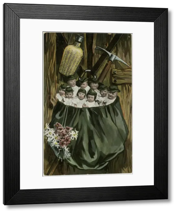 Framed Print : Babies in a large bag with flowers Framed Print : Babies in a large bag with flowers