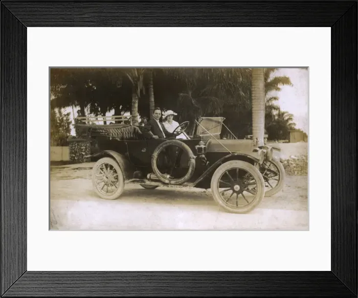 Framed Print : Man and woman in a touring car, USA Framed Print : Man and woman in a touring car, USA