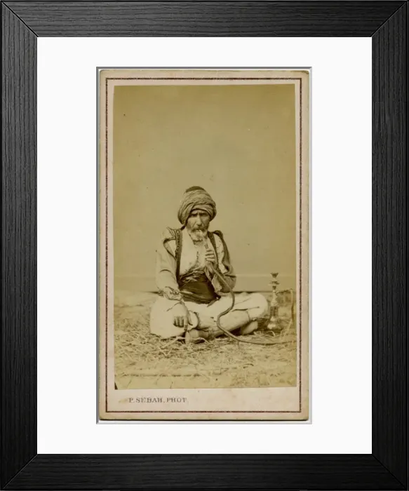 Framed Print : Gentleman puffing on his pipe - Istanbul, Turkey Framed Print : Gentleman puffing on his pipe - Istanbul, Turkey