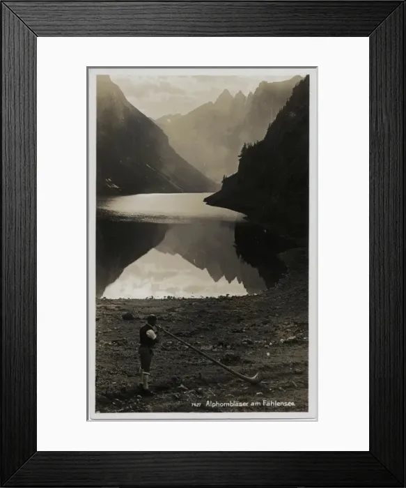Framed Print : Playing the Alpenhorn on banks of the Falensee, Switzerland Framed Print : Playing the Alpenhorn on banks of the Falensee, Switzerland