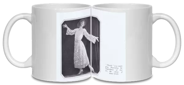 A portrait of the dancer Oilvette in an elegant dance frock