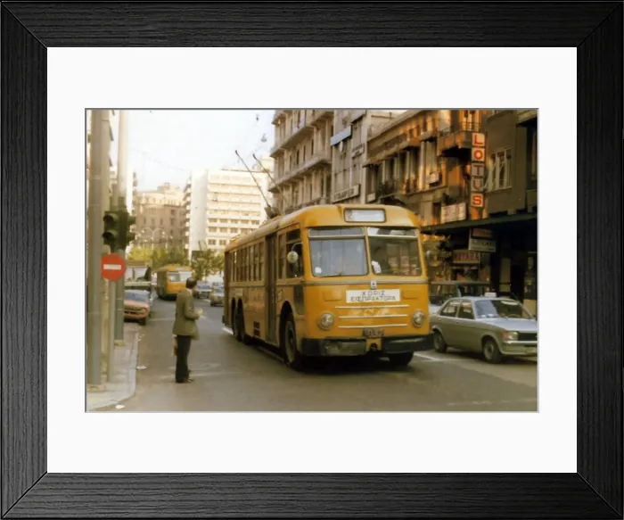 Framed Print : Yellow cable buses on a busy main road in Athens Framed Print : Yellow cable buses on a busy main road in Athens