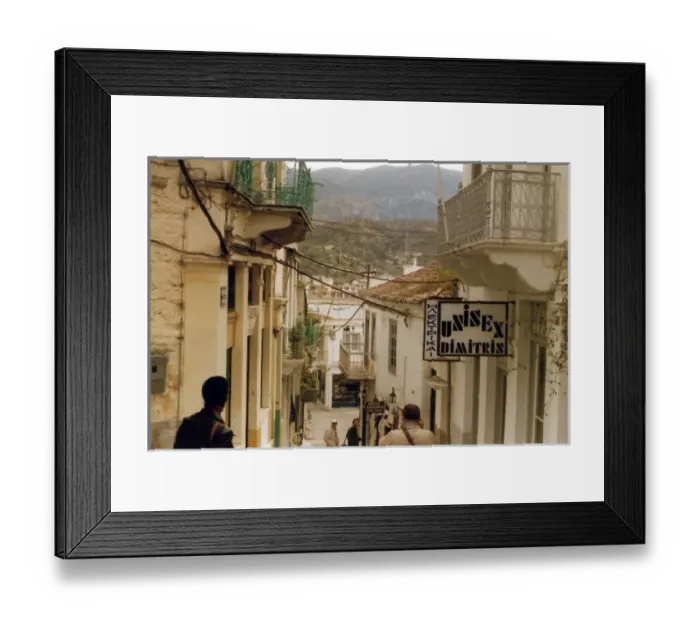 Framed Print : A narrow build up street on a Greek Island Framed Print : A narrow build up street on a Greek Island