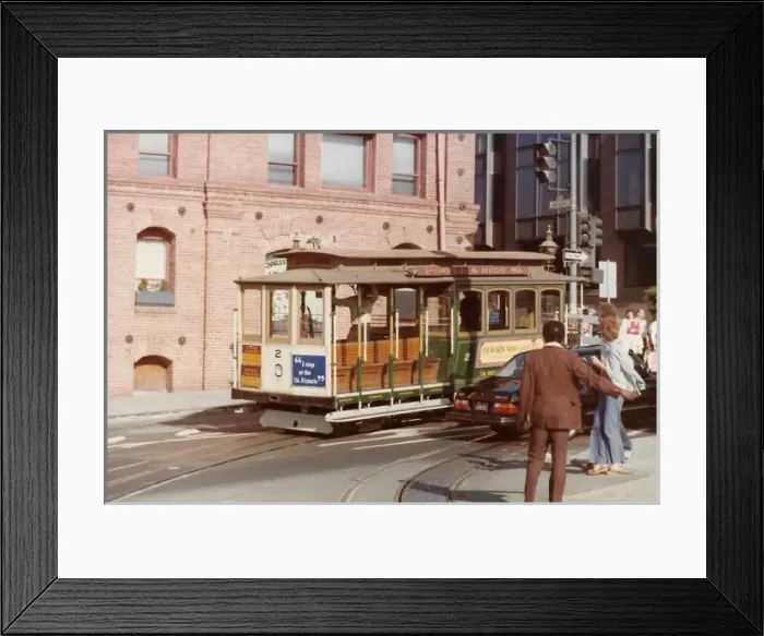 Framed Print : People standing by a cable cart track in San Francisco USA Framed Print : People standing by a cable cart track in San Francisco USA