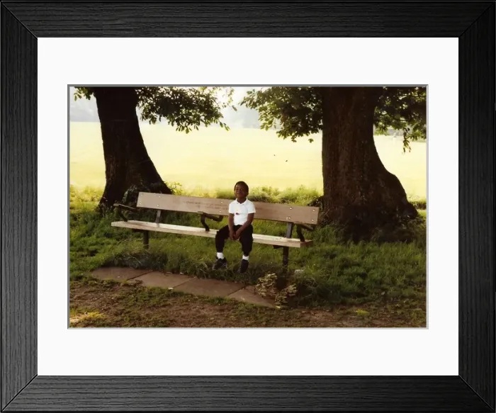 Framed Print : British Caribbean Heritage - Boy on the bench Hampstead Lond Framed Print : British Caribbean Heritage - Boy on the bench Hampstead Lond