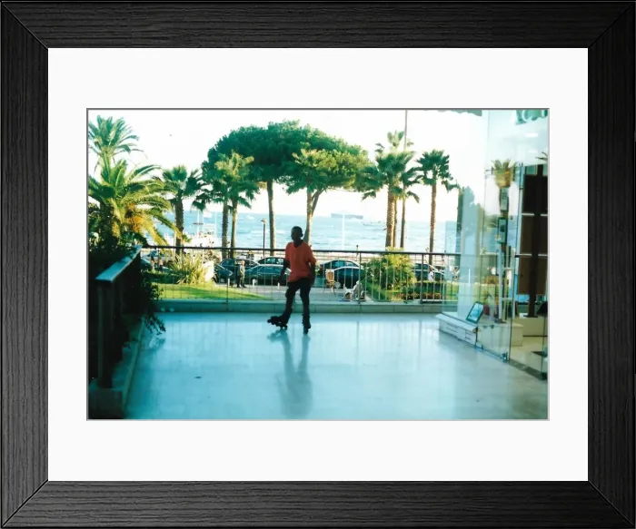 Framed Print : British Caribbean Heritage - Boy with roller skates in Canne Framed Print : British Caribbean Heritage - Boy with roller skates in Canne
