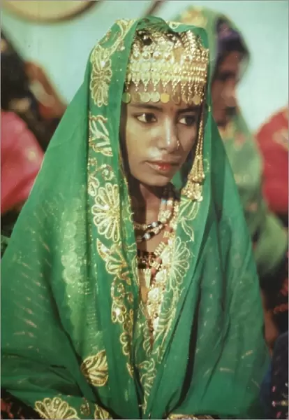 Young girl in traditional Omani dress in Oman
