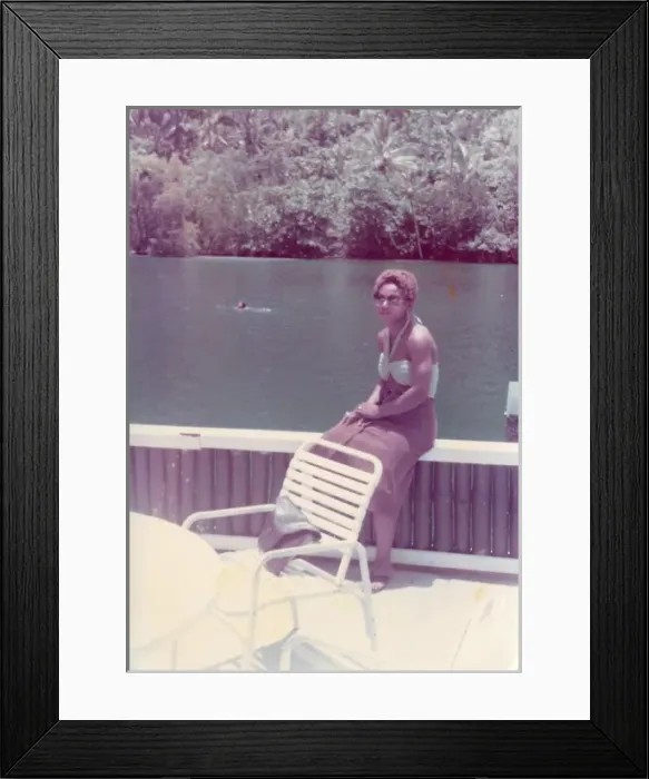 Framed Print : British Caribbean woman sitting by the Blue Lagoon in Port A Framed Print : British Caribbean woman sitting by the Blue Lagoon in Port A