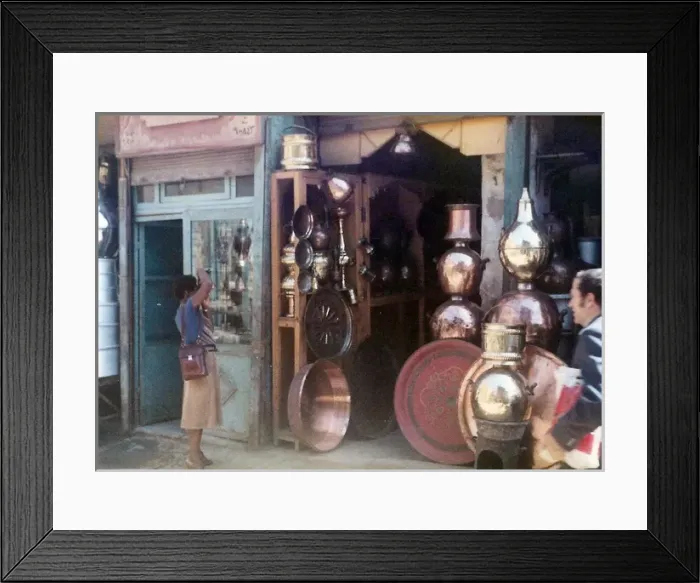 Framed Print : Lorna Holder photographing the front of a Egyptian novelty s Framed Print : Lorna Holder photographing the front of a Egyptian novelty s