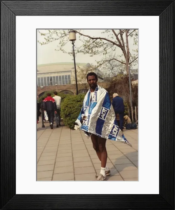 Framed Print : British Caribbean runner standing with ADT sponsored foil wr Framed Print : British Caribbean runner standing with ADT sponsored foil wr