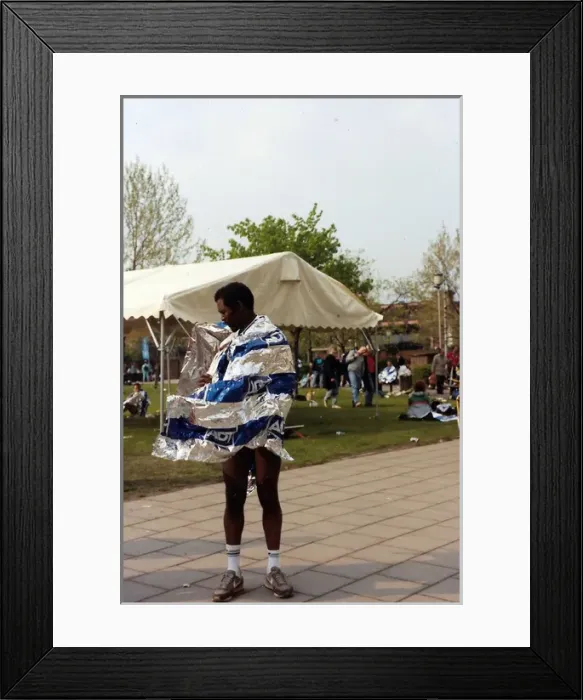 Framed Print : British Caribbean runner standing with wind swept foil wrap Framed Print : British Caribbean runner standing with wind swept foil wrap