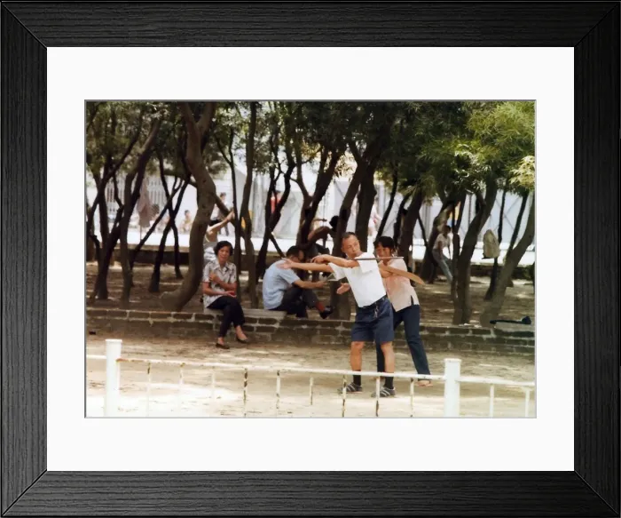 Framed Print : Chinese people shadow boxing in the park in Hong Kong Framed Print : Chinese people shadow boxing in the park in Hong Kong