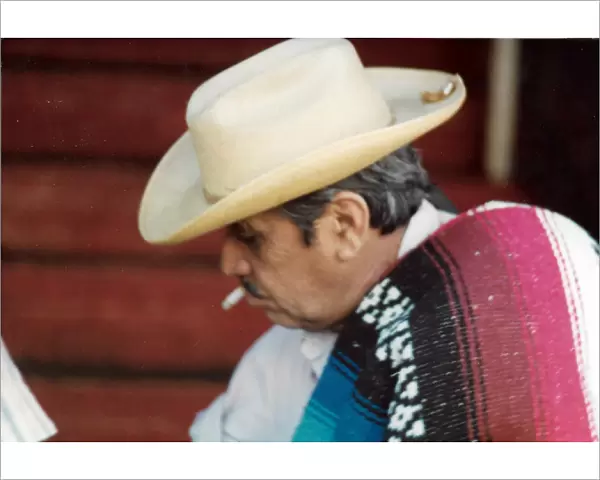 Mexican man with cigarette and hat