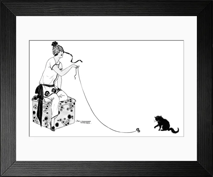 Framed Print : Young stylish lady playing with her little black kitten Framed Print : Young stylish lady playing with her little black kitten