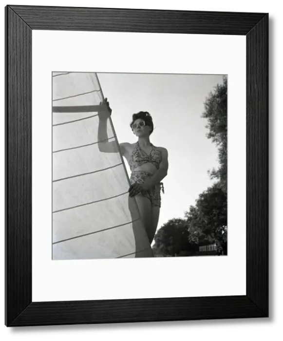 Framed Print : Woman on St Ives beach with yacht sail Framed Print : Woman on St Ives beach with yacht sail