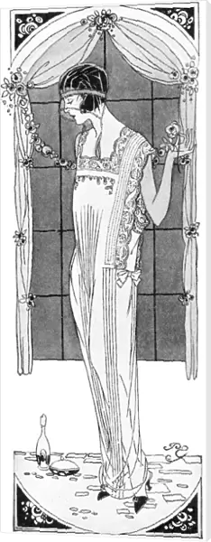 Woman wears a nightdress from Robinson & Cleaver