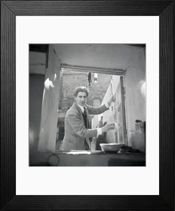 Framed Print : Unknown man at a window Framed Print : Unknown man at a window