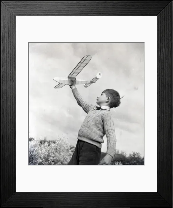 Framed Print : Boy with a model aeroplane Framed Print : Boy with a model aeroplane