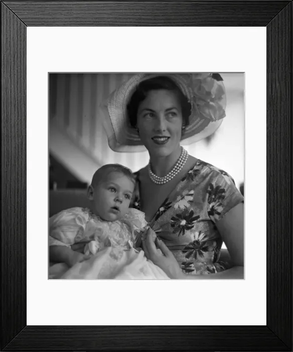 Framed Print : Mother and child after a christening Framed Print : Mother and child after a christening