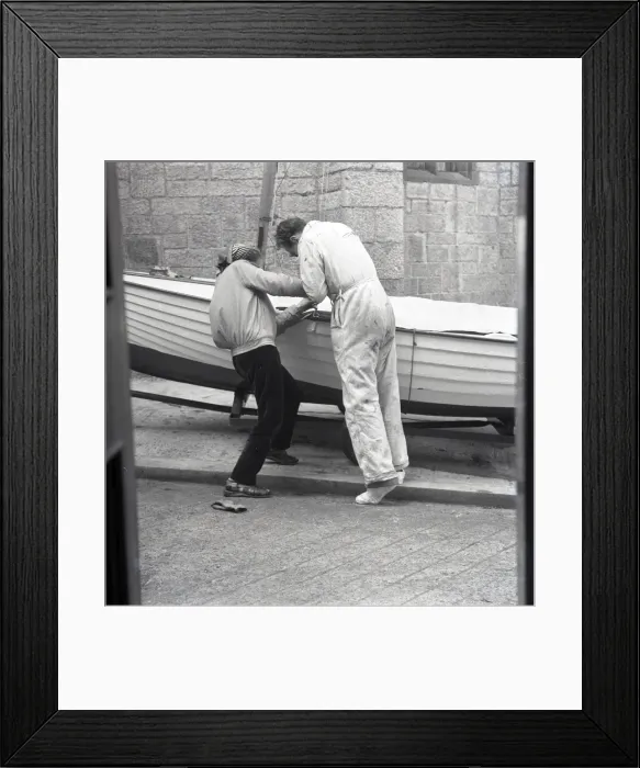 Framed Print : Two people preparing a sailing dinghy Framed Print : Two people preparing a sailing dinghy