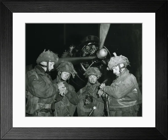 Framed Print : Four British Paratroop officers setting watches Framed Print : Four British Paratroop officers setting watches