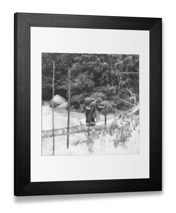 Framed Print : British soldier crossing the river on a log, Malaya, 1946 Framed Print : British soldier crossing the river on a log, Malaya, 1946