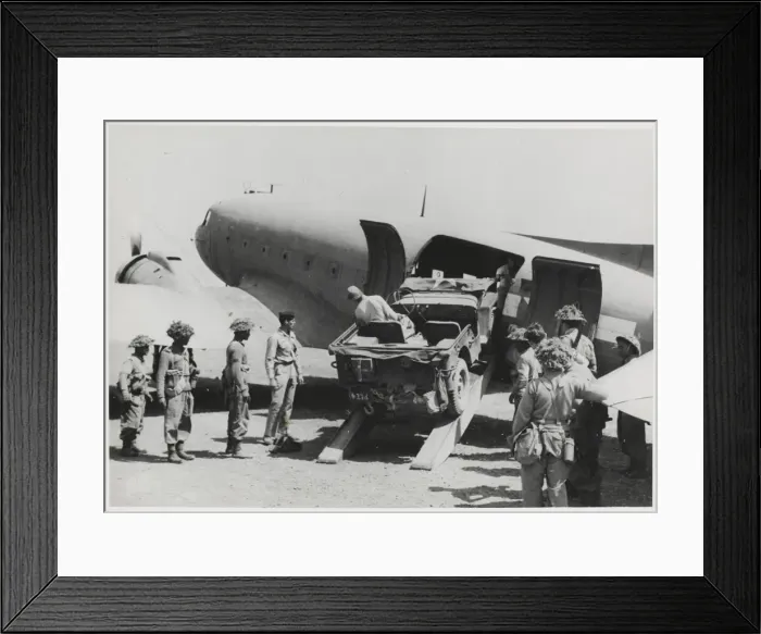 Framed Print : Jeep being loaded into the fuselage of a Dakota transport pl Framed Print : Jeep being loaded into the fuselage of a Dakota transport pl