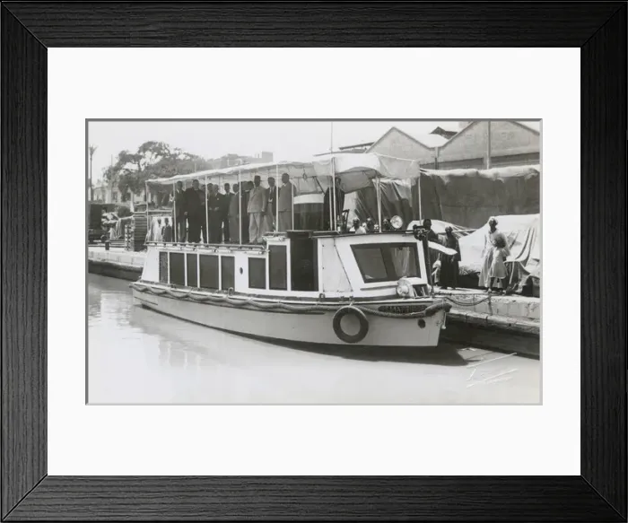 Framed Print : Group of people on motor boat named St. Martinus Framed Print : Group of people on motor boat named St. Martinus
