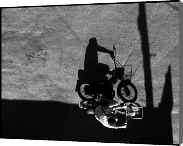 Motor bike and shadow, Spain