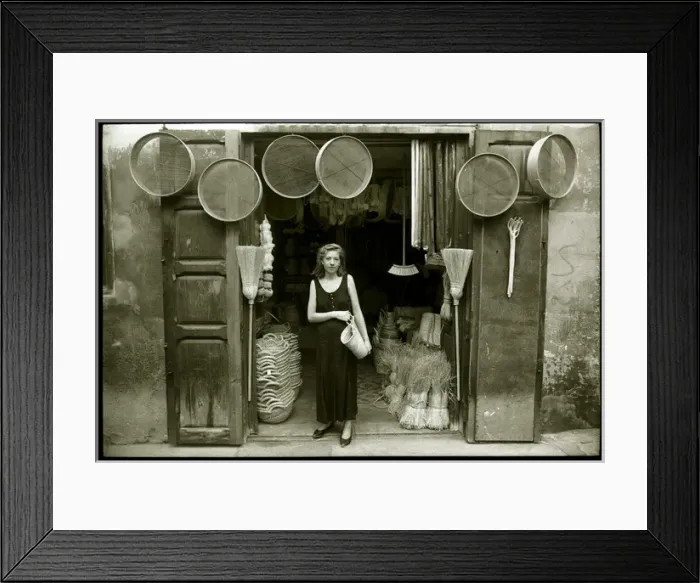 Framed Print : Young woman outside hardware shop, Valencia, Spain Framed Print : Young woman outside hardware shop, Valencia, Spain