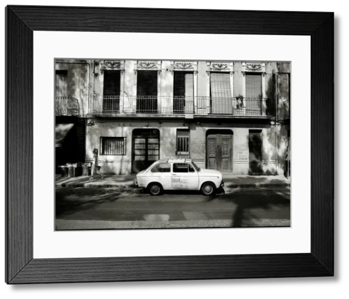 Framed Print : Dappled sunlight pedestrian and car, Valencia, Spain Framed Print : Dappled sunlight pedestrian and car, Valencia, Spain