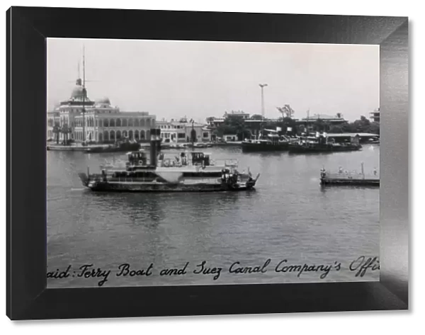 Ferry boat and Suez Canal Company office in Port Said, Egypt