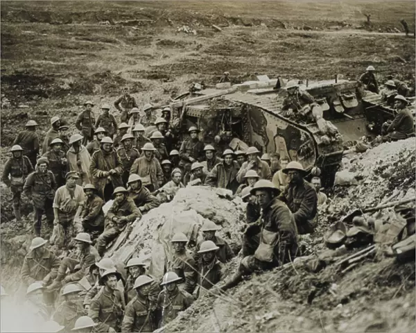 A Mark I tank surrounded by troops of 122nd Brigade