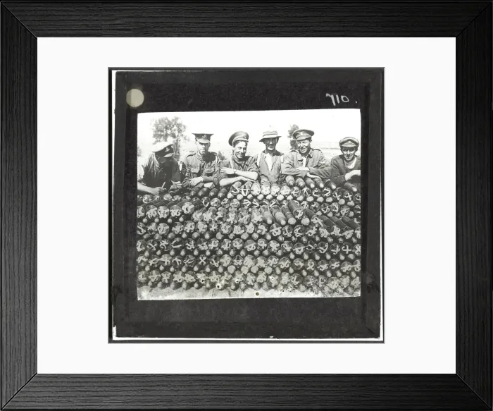 Framed Print : Soldiers lean on pile of 18-pounder shells nr Becourt Wood Framed Print : Soldiers lean on pile of 18-pounder shells nr Becourt Wood