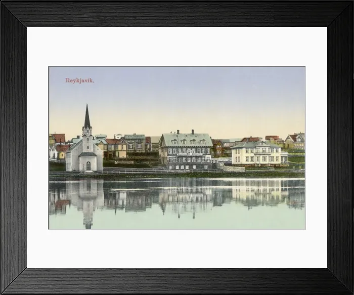 Framed Print : Free church at the waterside of Lake Tjornin, Iceland Framed Print : Free church at the waterside of Lake Tjornin, Iceland