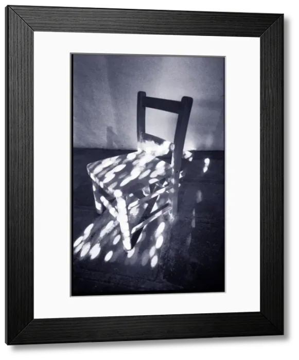 Framed Print : Chair in dappled sunlight Framed Print : Chair in dappled sunlight
