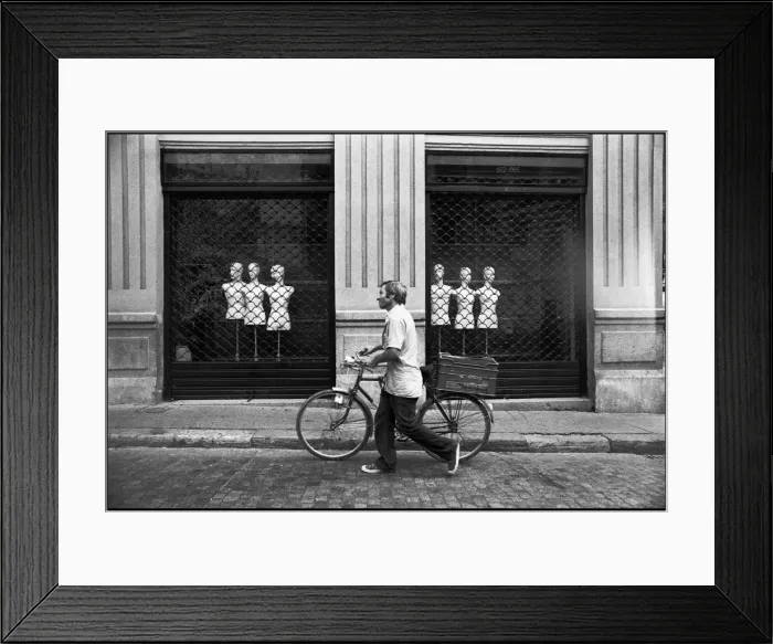 Framed Print : Man with bike shop front, Valencia, Spain Framed Print : Man with bike shop front, Valencia, Spain