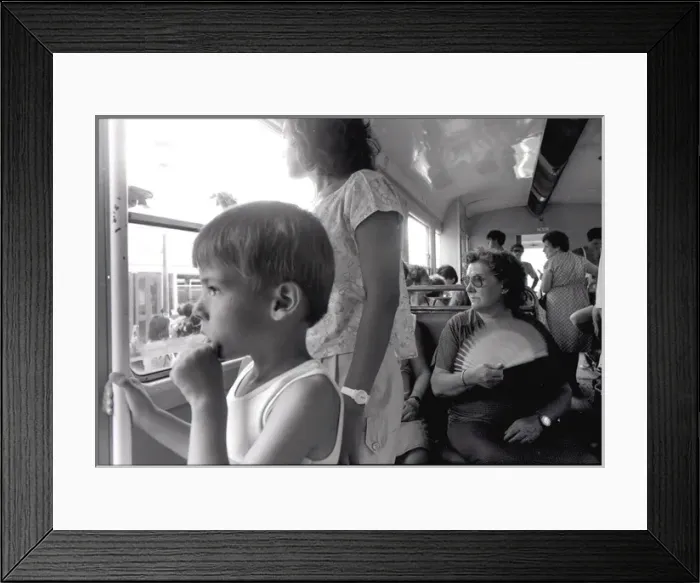 Framed Print : Small boy lady with fan on bus, Valencia, Spain Framed Print : Small boy lady with fan on bus, Valencia, Spain