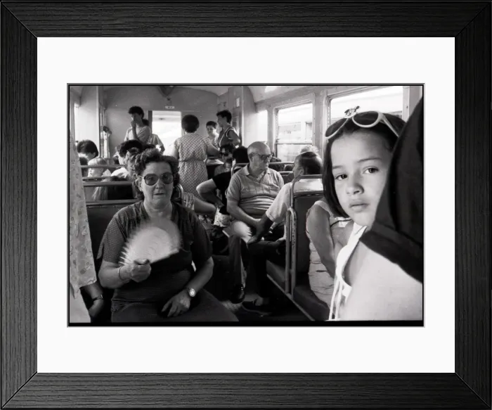 Framed Print : Little girl woman with fan on Tram, Valencia, Spain Framed Print : Little girl woman with fan on Tram, Valencia, Spain